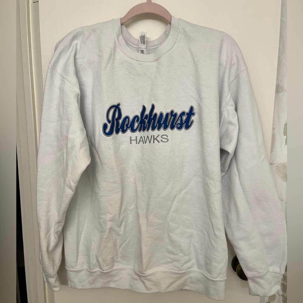 Jerzees White Crewneck Sweater with Blue Rockhurst Hawks Logo